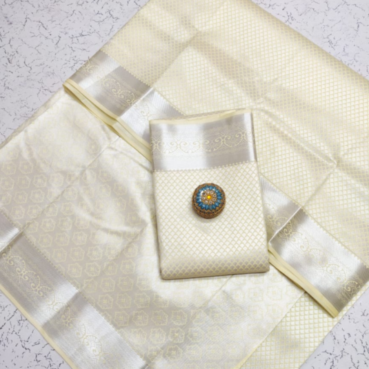 cream saree with silver border